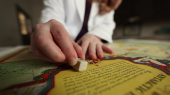 a library preservation specialist working on restoring a document