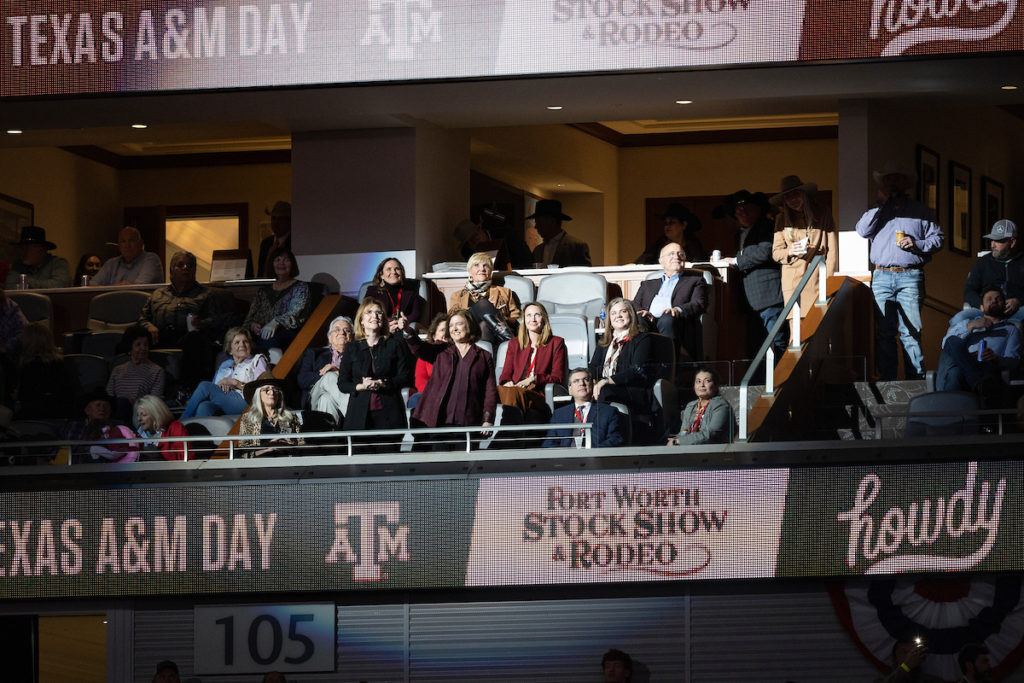 President M. Katherine Banks greets the rodeo crowd