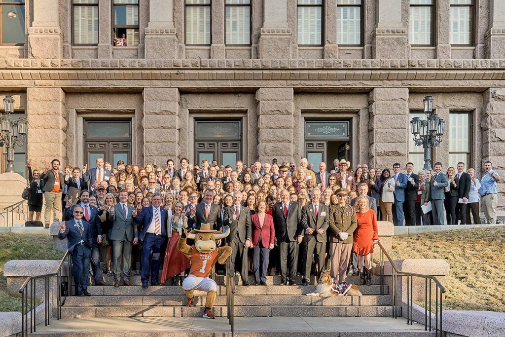 representatives from A&M and UT at the state capitol building