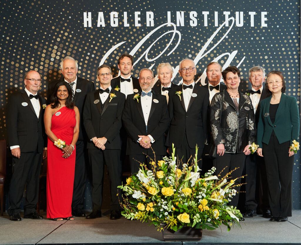 Twelve Hagler Fellows and a Distinguished Lecturer attended the induction ceremony for the Class of 2022-23: (Front from left) Guy Bertrand, University of California San Diego; Madhavi Sunder, Georgetown Law Center; Jean-Paul Rodrigue, Hofstra University; Howard Frumkin, University of Washington School of Public Health; Lawrence Que Jr., University of Minnesota; Catherine Dulac, Harvard University (Hagler Distinguished Lecturer); and Hui Cao, Yale University. (Back row from left) Dimitar Filev, Ford Research and Innovation Center; Sebastian “Bas” Jonkman, Delft University of Technology, Netherlands; Michael W. Young, The Rockefeller University; Donald L. Sparks, University of Delaware; and John Michael Cullen, North Carolina State University. Not pictured: Mark O’Malley, Imperial College London.