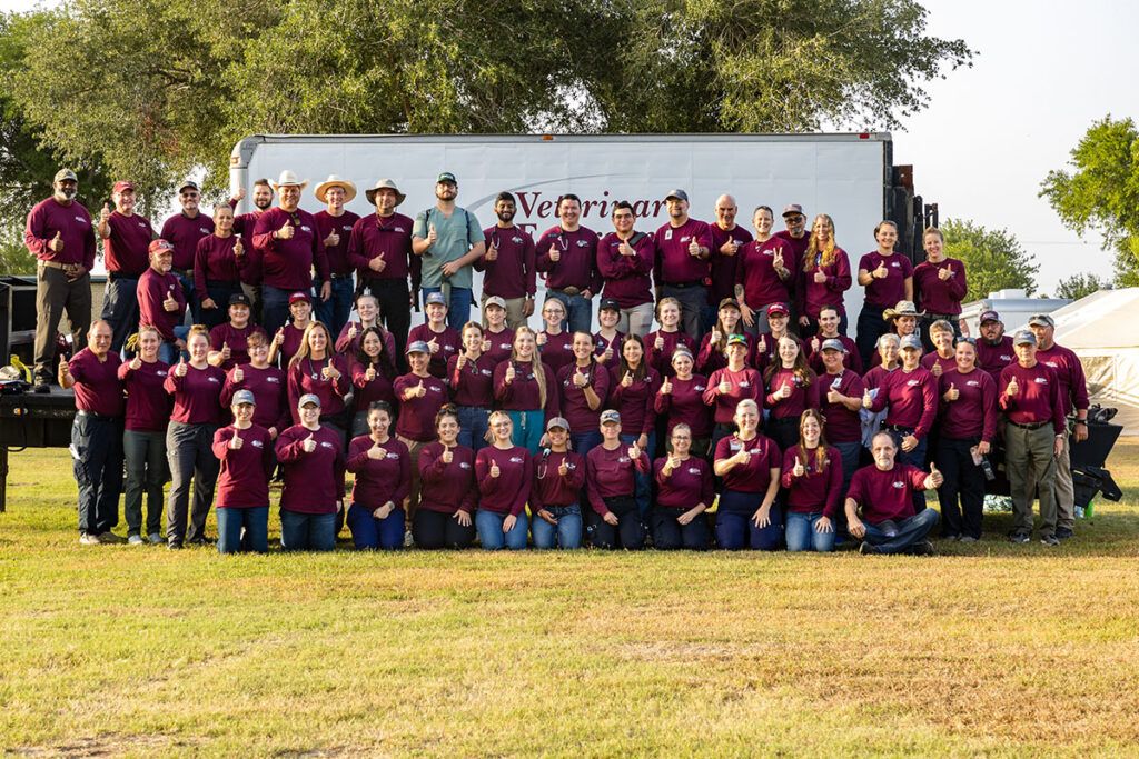 the veterinary emergency team gathered before their mobile clinic