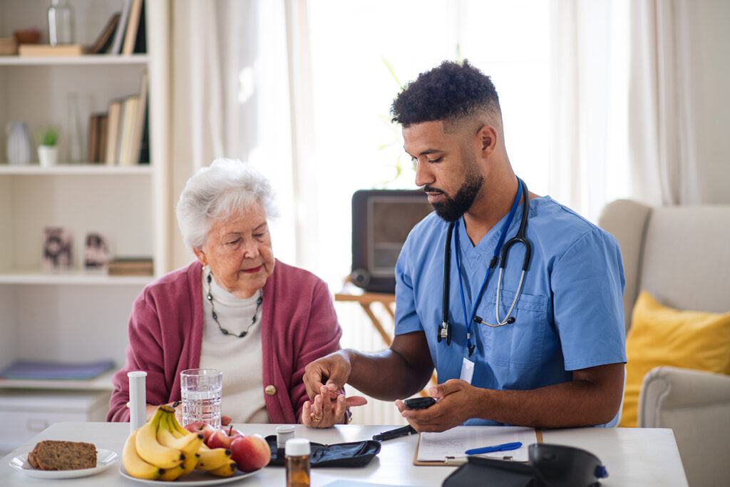 a home nurse caring for a senior patient