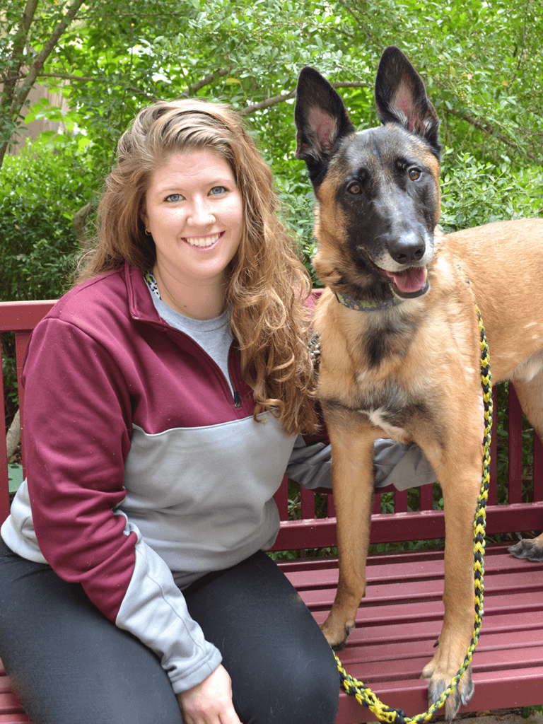 a photo of a veterinarian and a dog