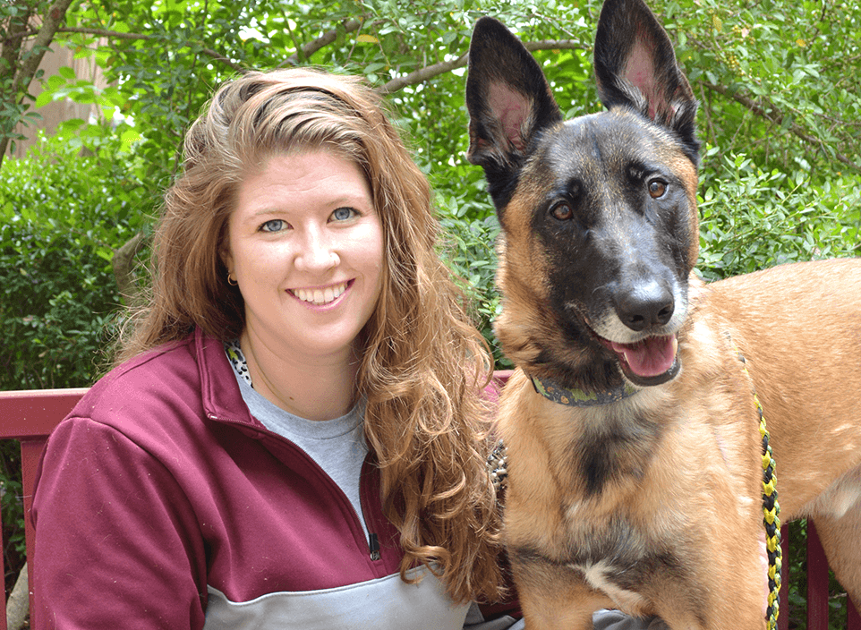 a photo of a veterinarian and a dog