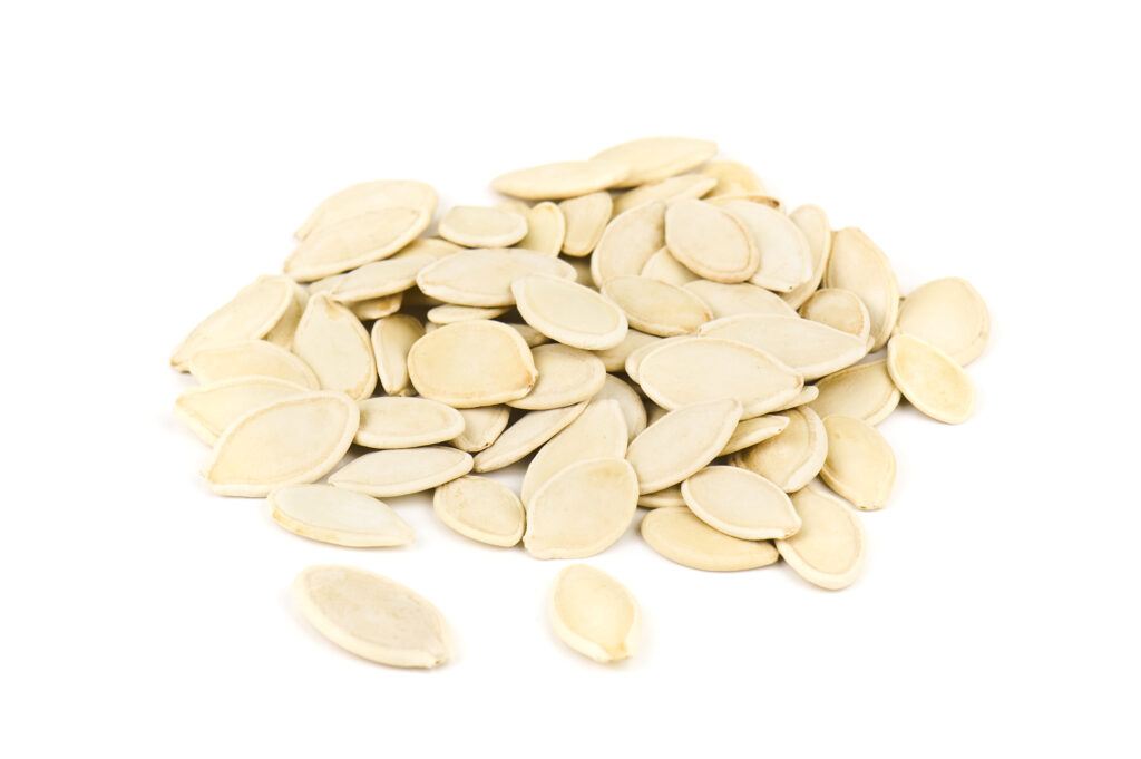 pile of pumpkin seed on white