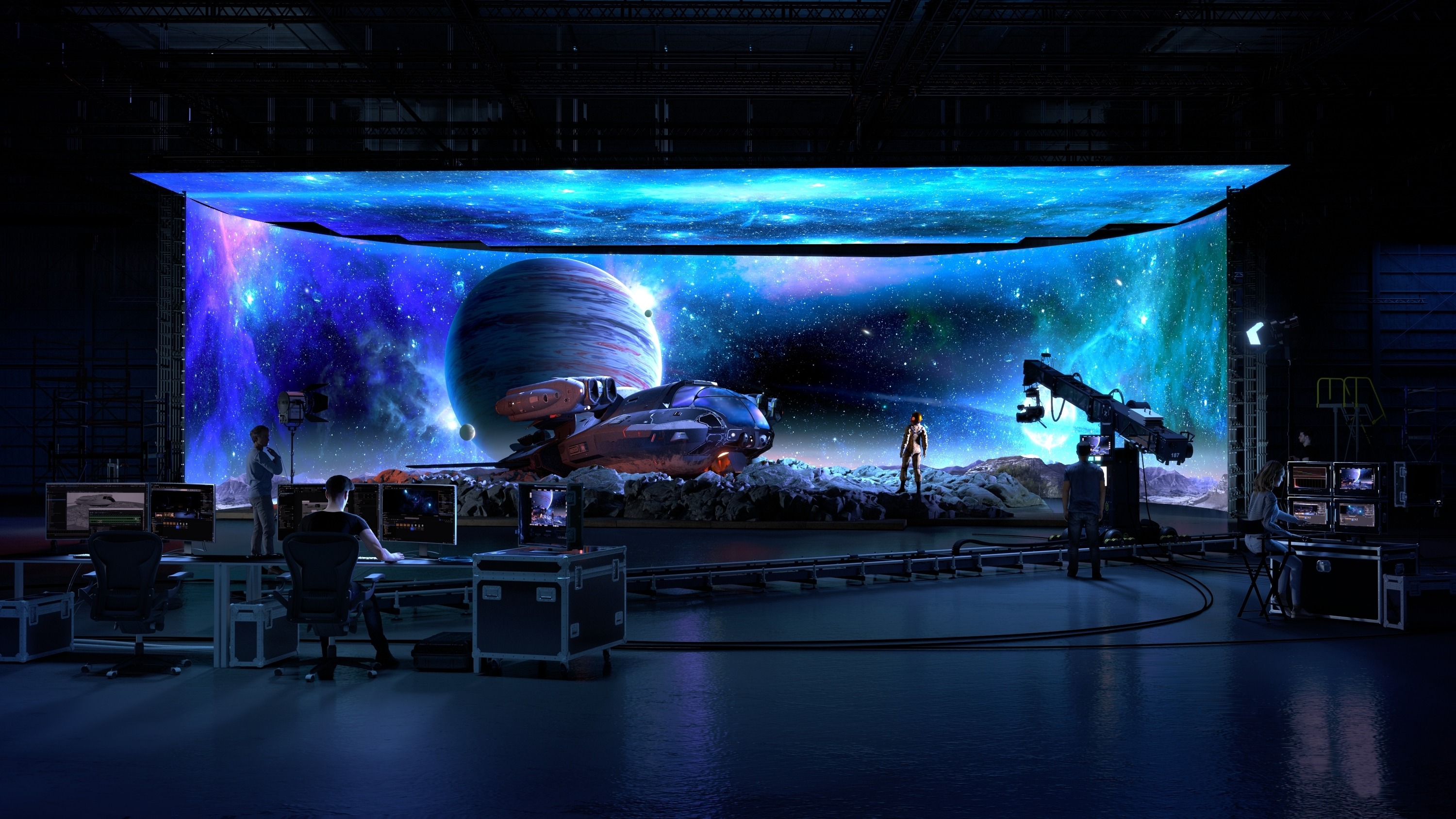 A photo of a virtual production studio and LED wall showing computer-generated imagery combined with a woman being filmed on a stage.