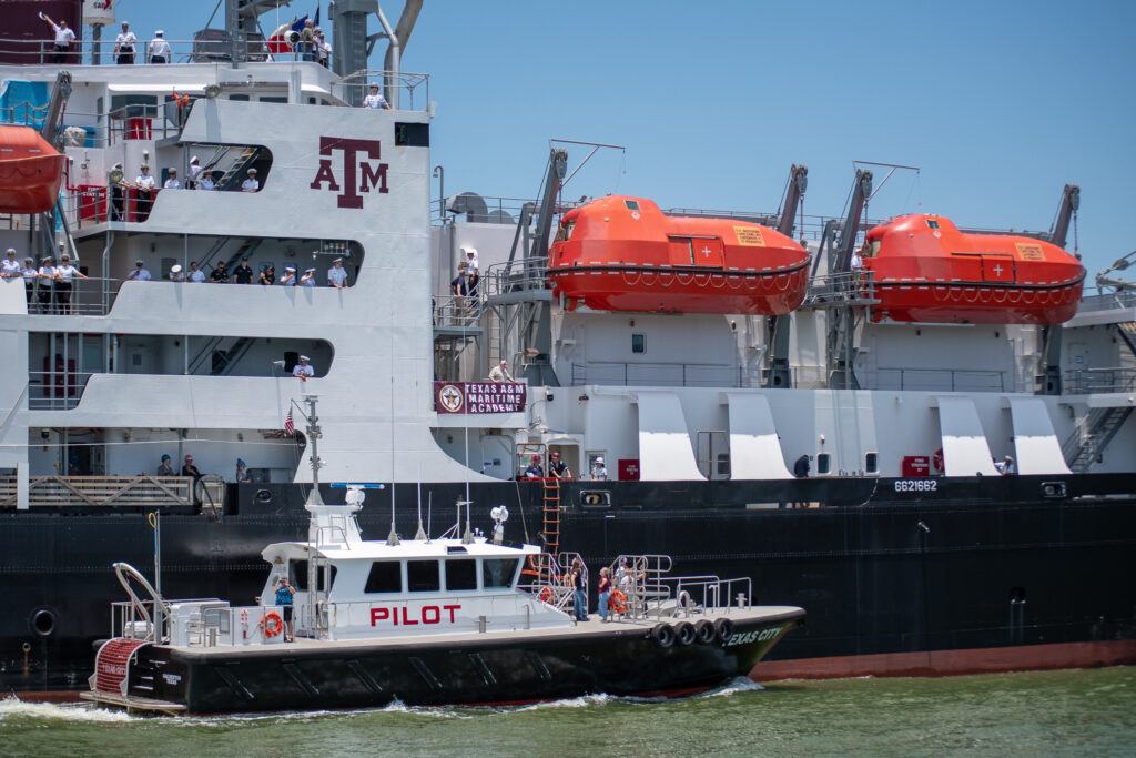 TS Kennedy with pilot boat
