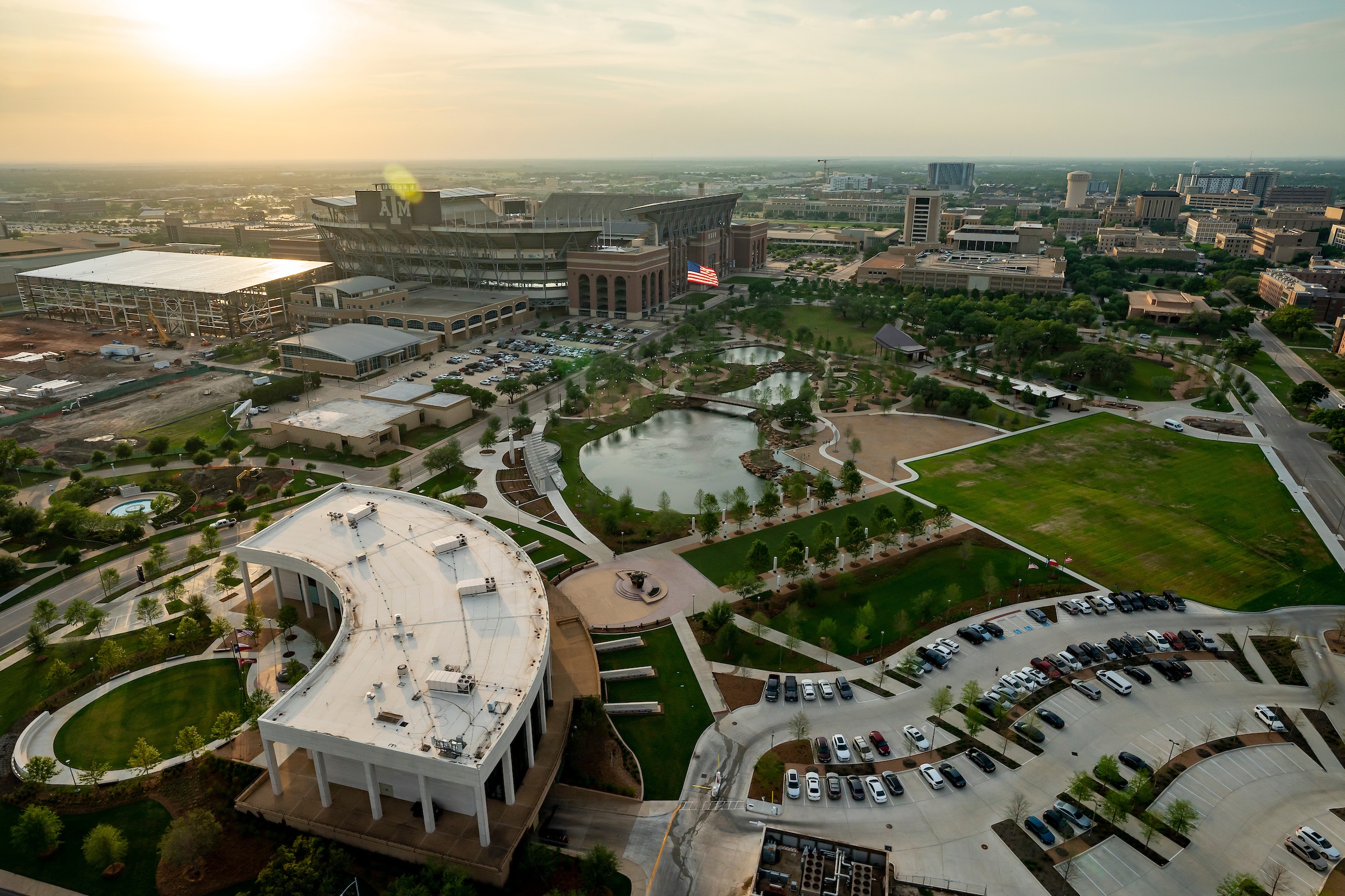 an aerial photo of campus showing Aggie Park across from Kyle Field, with the rest of campus in the background