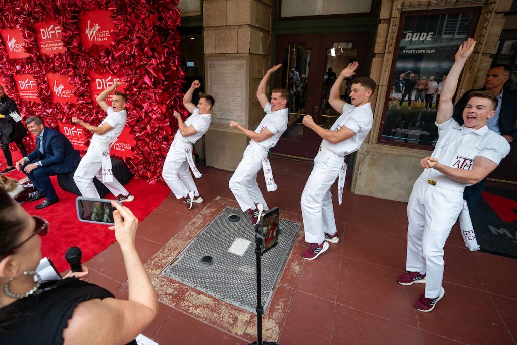 Yell Leaders performing an Aggie Yell on the DIFF red carpet