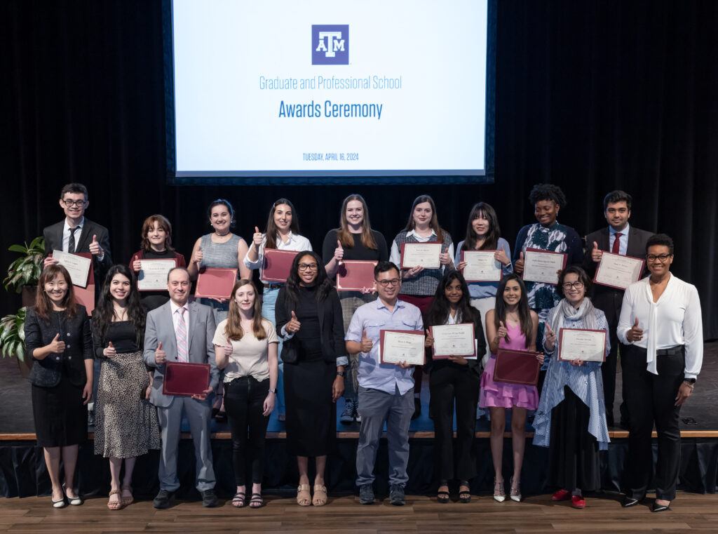 Grad school leaders pose with the winners