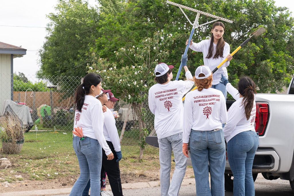tools being handed to volunteers