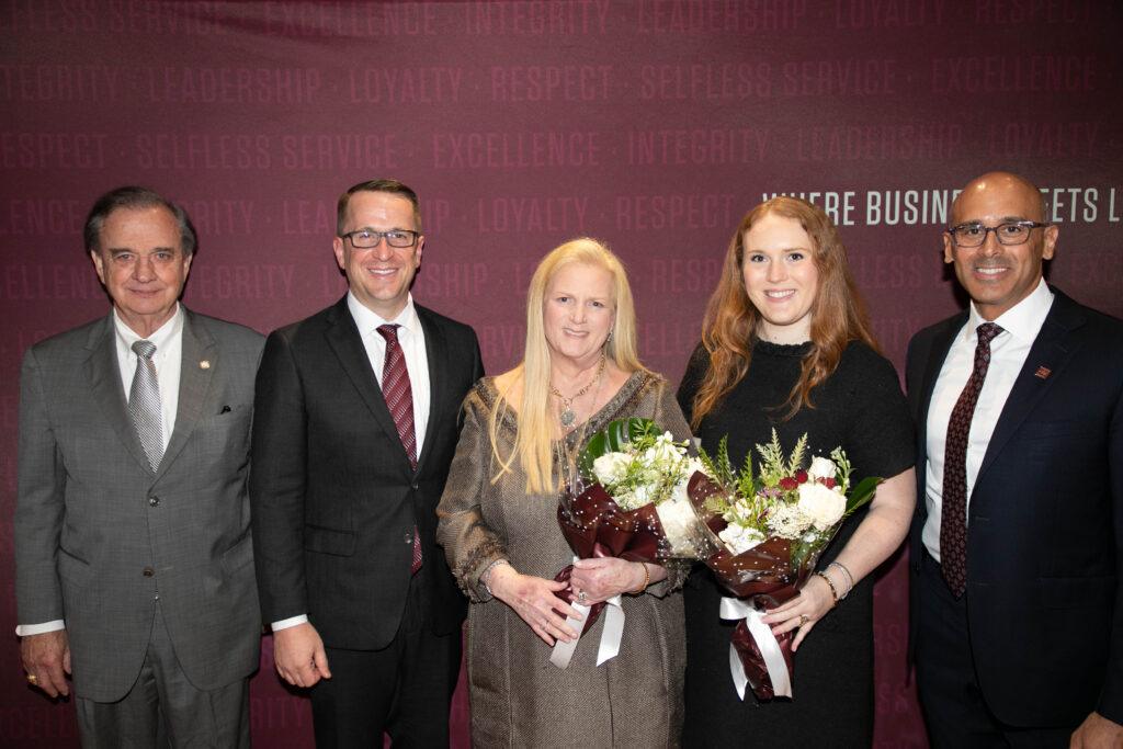 Group photo at the awards presentation of John Sharp, Nate Sharp, Kathy Mays Johnson, Paige Johnson and Tyson Voelkel