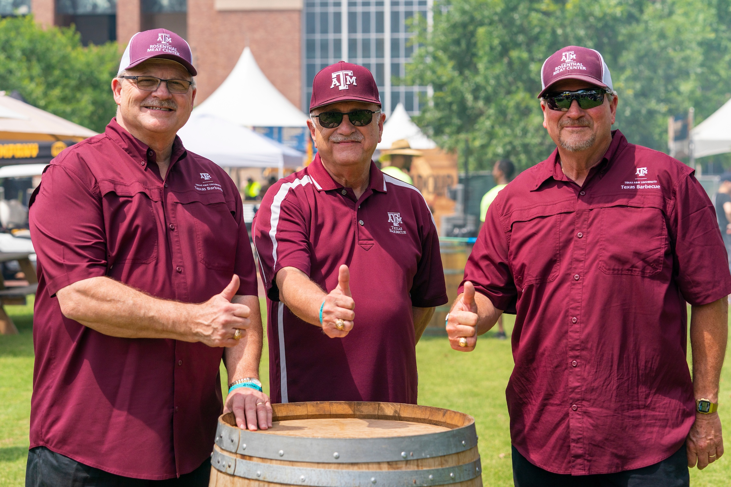 From left to right, Davey Griffin, Jeffrey Savell and Ray Riley give the gig'em thumbs up.