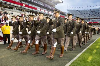 Cadets from Texas A&M University marching into Kyle Field in formation prior to a 2015 football game.