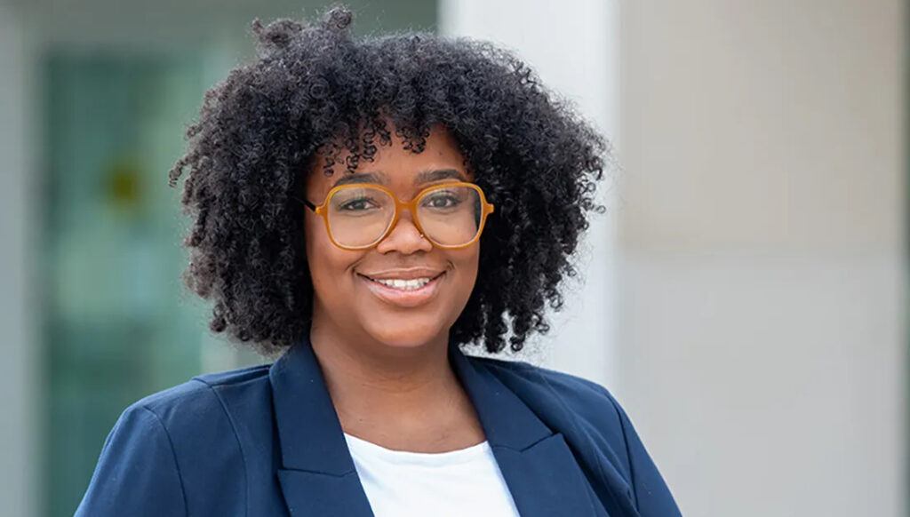 A portrait of Benika Dixon, an assistant professor in the Department of Epidemiology and Biostatistics at the Texas A&M University School of Public Health.