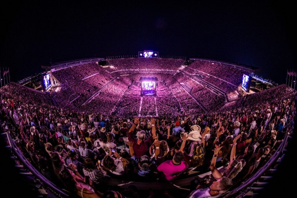 Fans cheer at a George Strait concert in Kyle Field.
