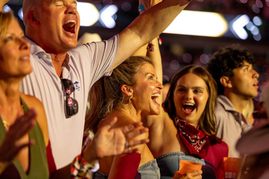 Fans cheer at a George Strait concert in Kyle Field.