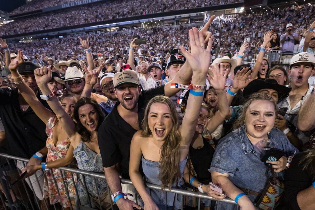 Fans cheer at a George Strait concert in Kyle Field.