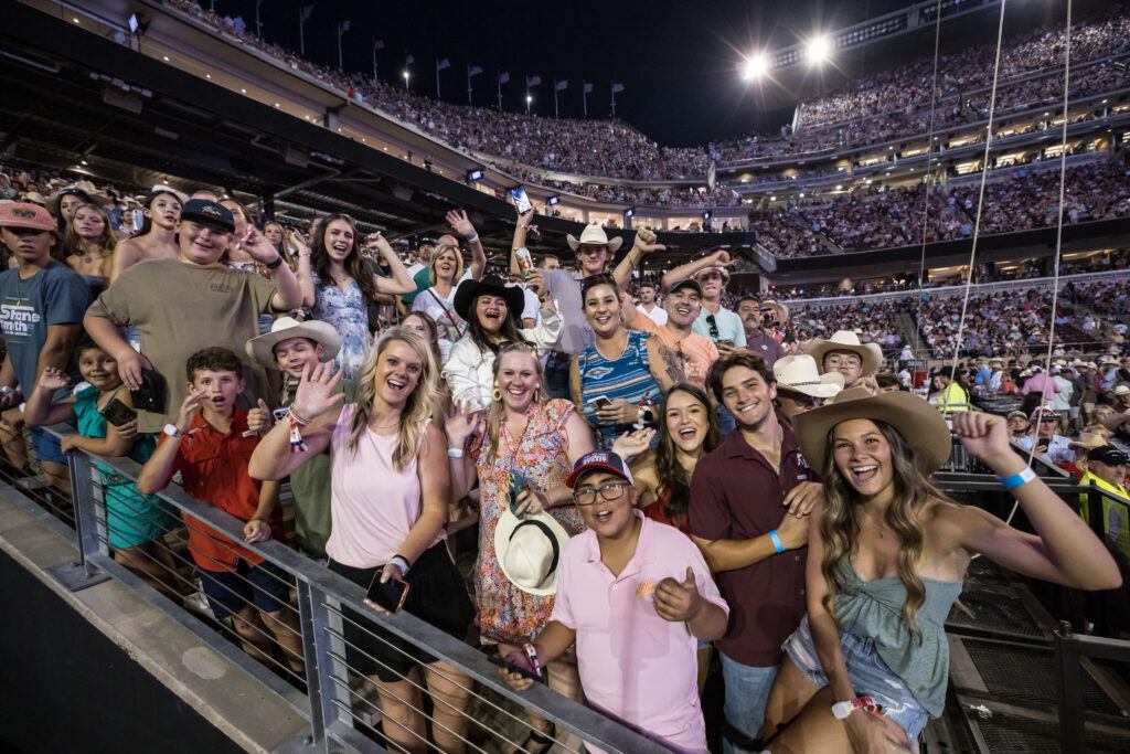 Fans cheer at a George Strait concert in Kyle Field.