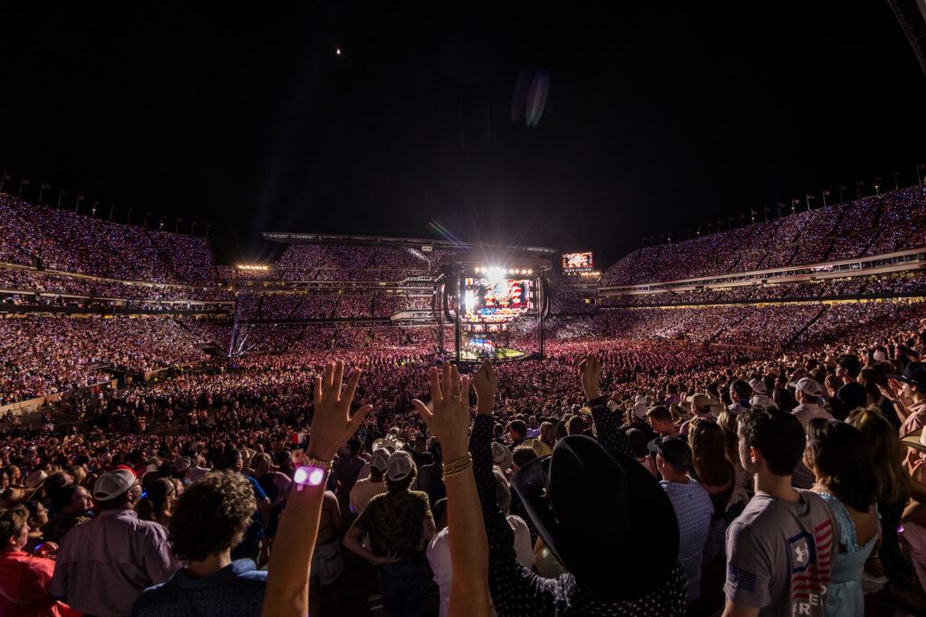 Fans cheer at a George Strait concert in Kyle Field.
