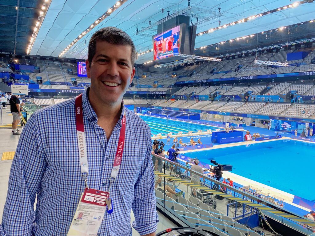 a photo of Fernando Palomo next to the pool at the Tokyo olympics