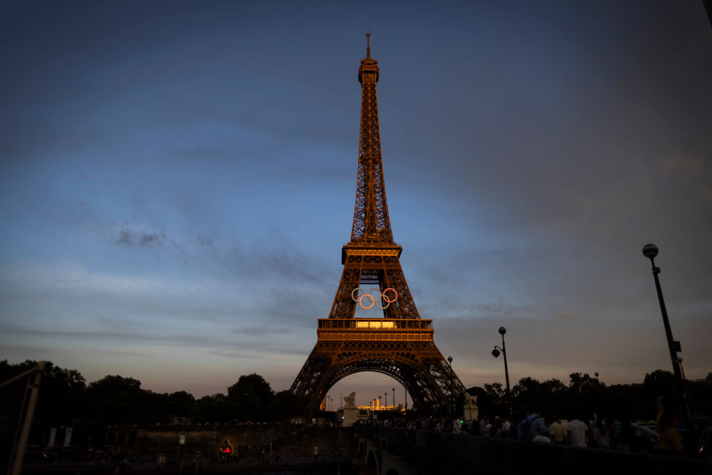 PARIS, FRANCE - JUNE 27: A general view of the Eiffel Tower at sunset as the Olympic Rings are displayed during previews ahead of the Paris 2024 Olympic Games on June 27, 2024 in Paris, France.
