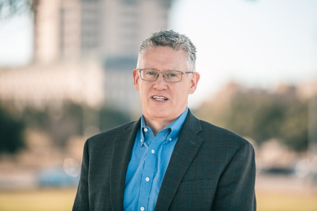 A photo of Peter Lange outside on the Texas A&M University campus.