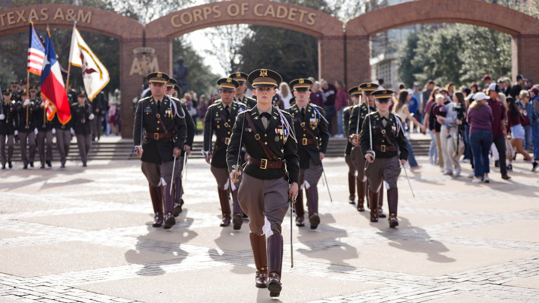 Cadets from Texas A&M University step off from The Quad during a fall march-in prior to a home football game.