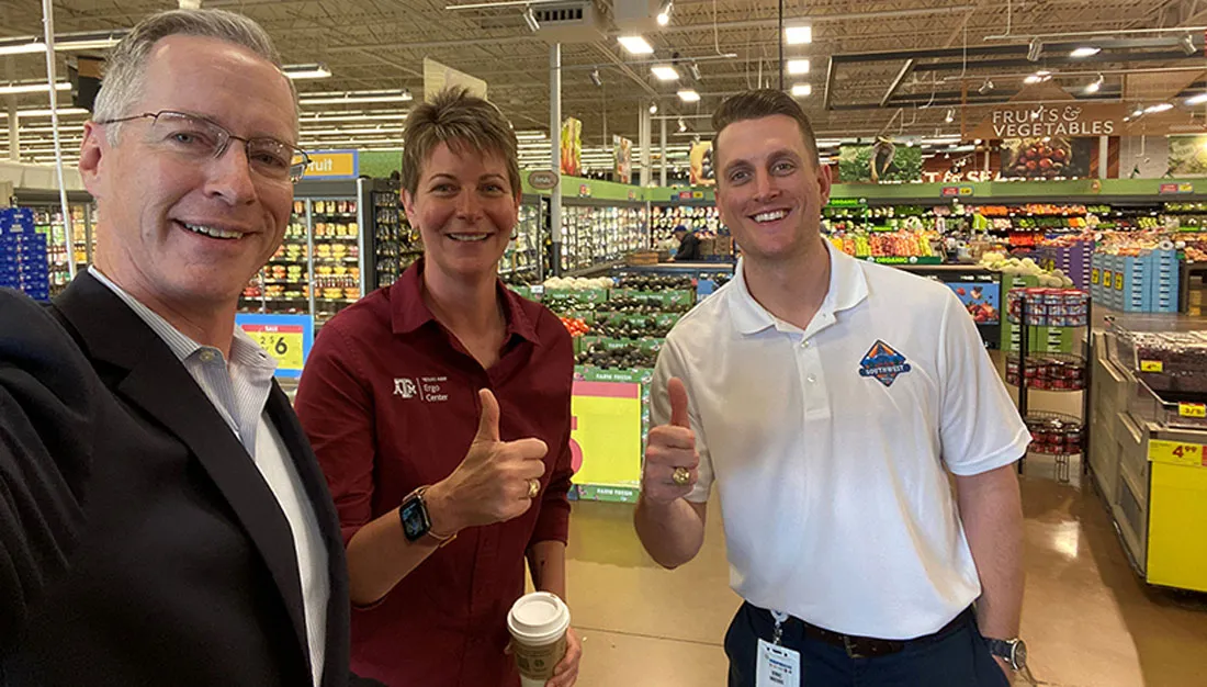 Department head and Center for Worker Health director Mark Benden, PhD (left), with center project director Martha Parker, MS, with former student Eric Weiss.