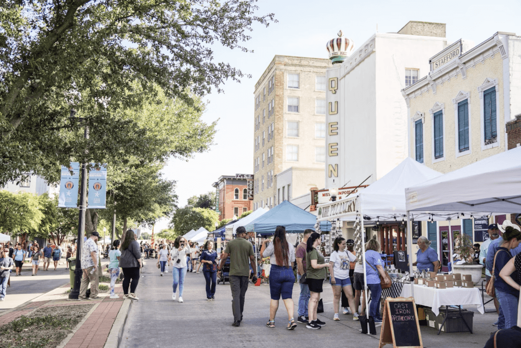Visitors stroll the streets of historic Downtown Bryan at First Friday