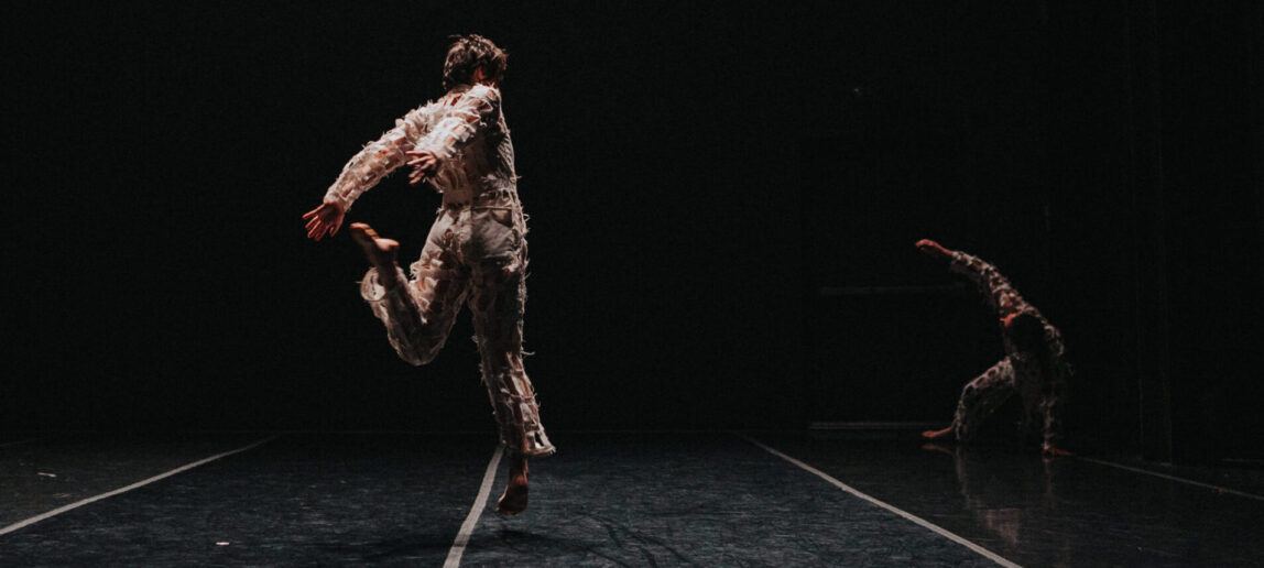 A photo of dancers on a stage.