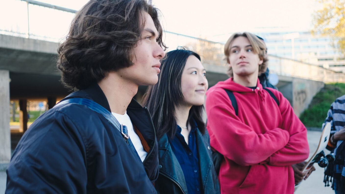 teens hanging out outside