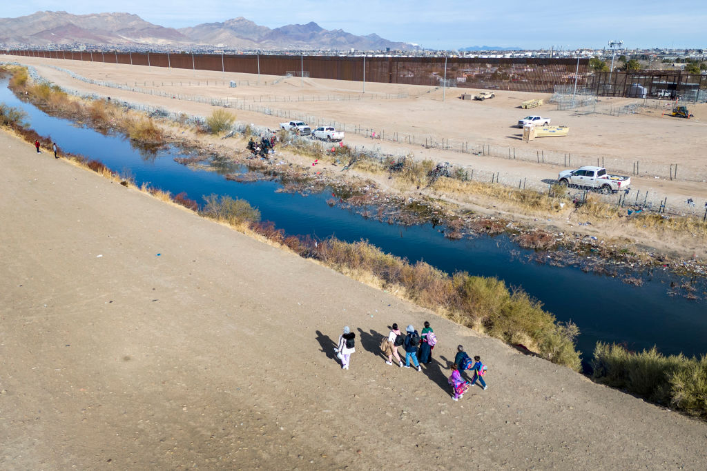 people walking along the Rio Grande Texas border