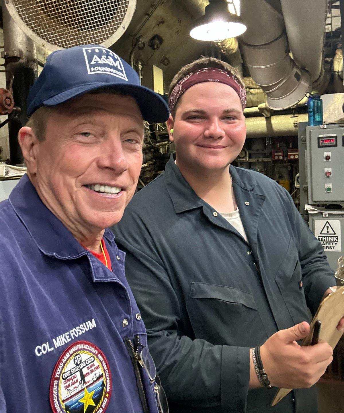 Mike Fossum smiling with a student at Texas A&M Galveston