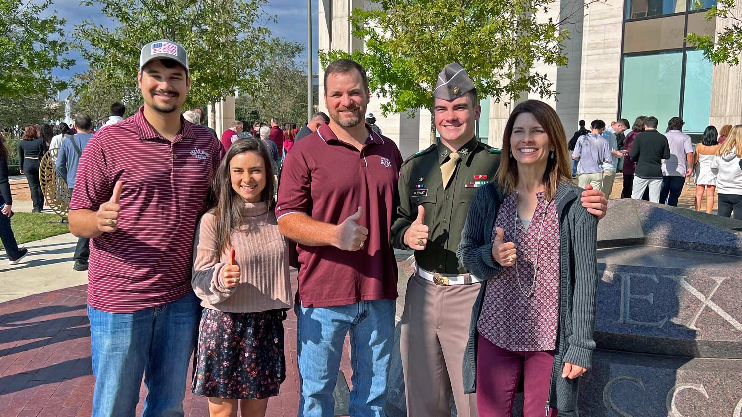 Eric Oliphant with his family at an Aggie Football game.