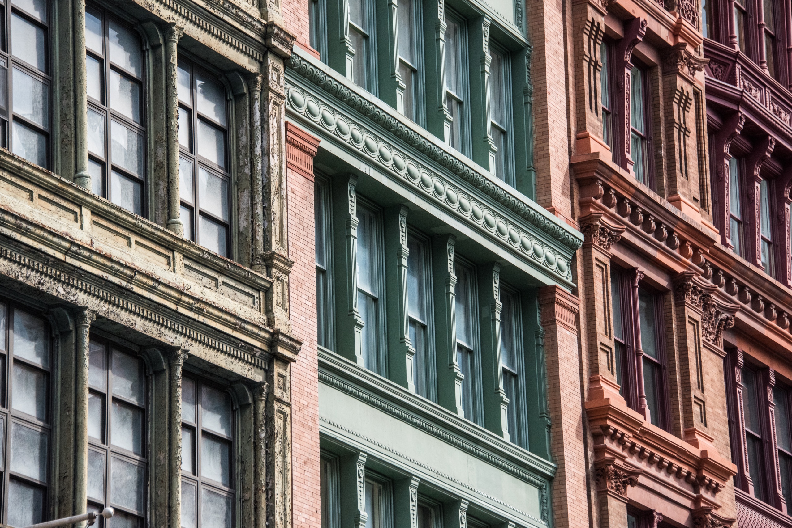 A photo of a building facade in the neighborhood of Soho in New York City.