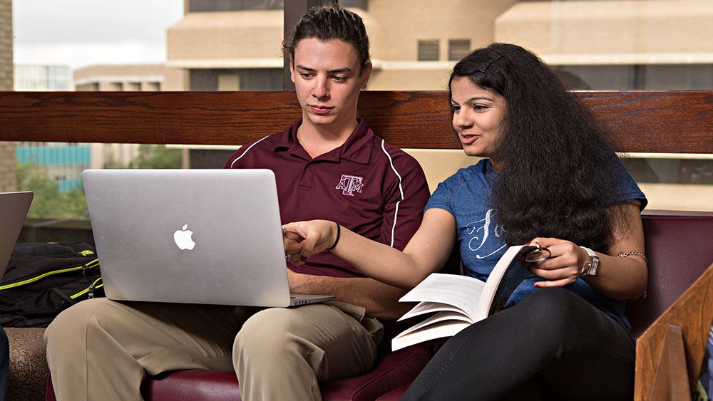 two Aggie students in the Zachry building