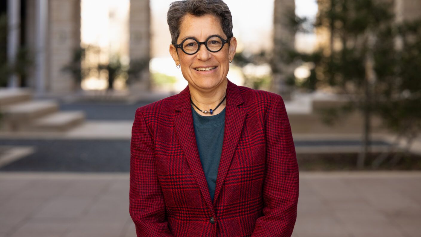 A photo of a woman posing for a portrait.