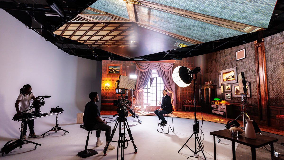 Multicam filming set up filming and interview in a high-tech screen stage