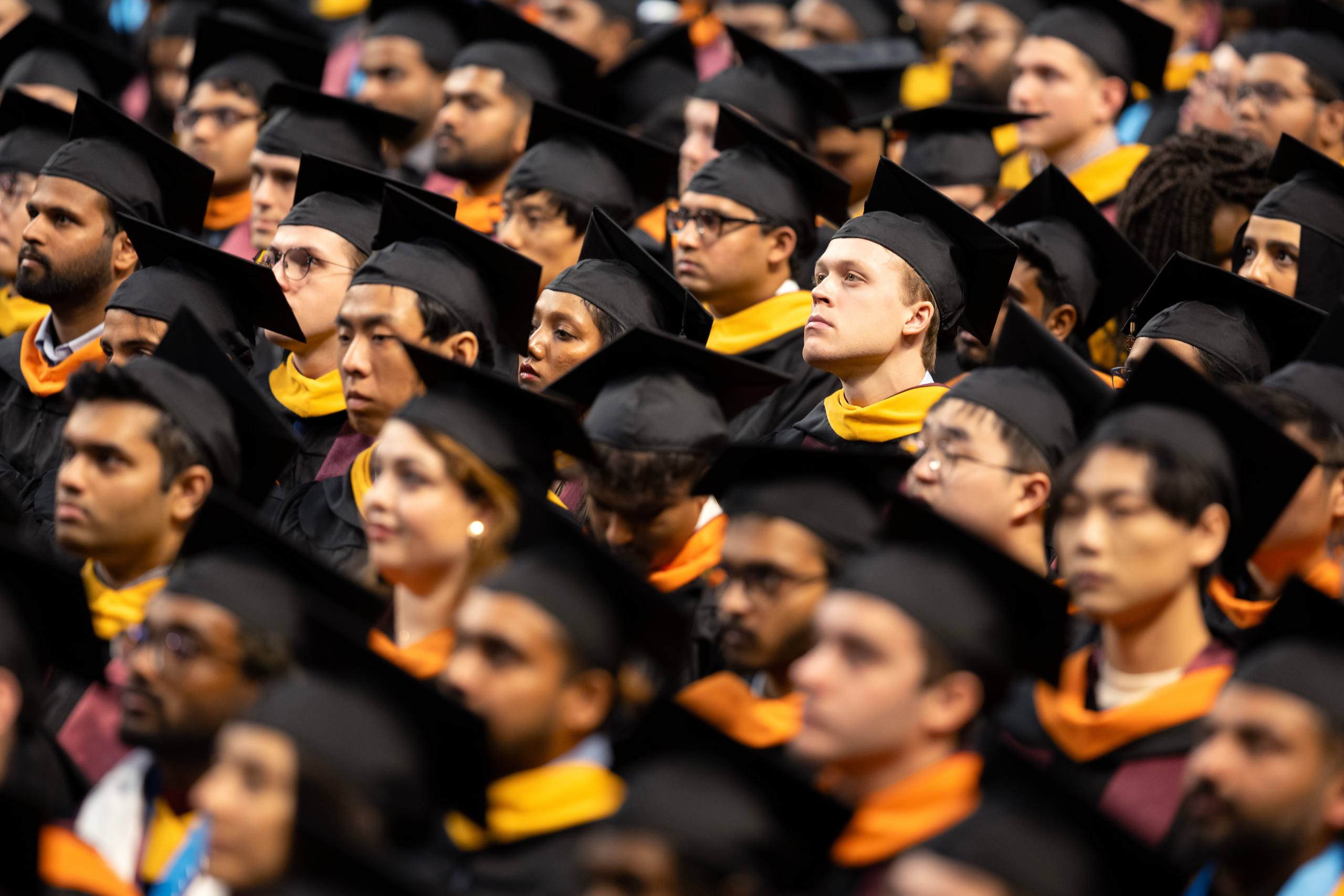 A photo of Texas A&M graduates during a commencement ceremony.