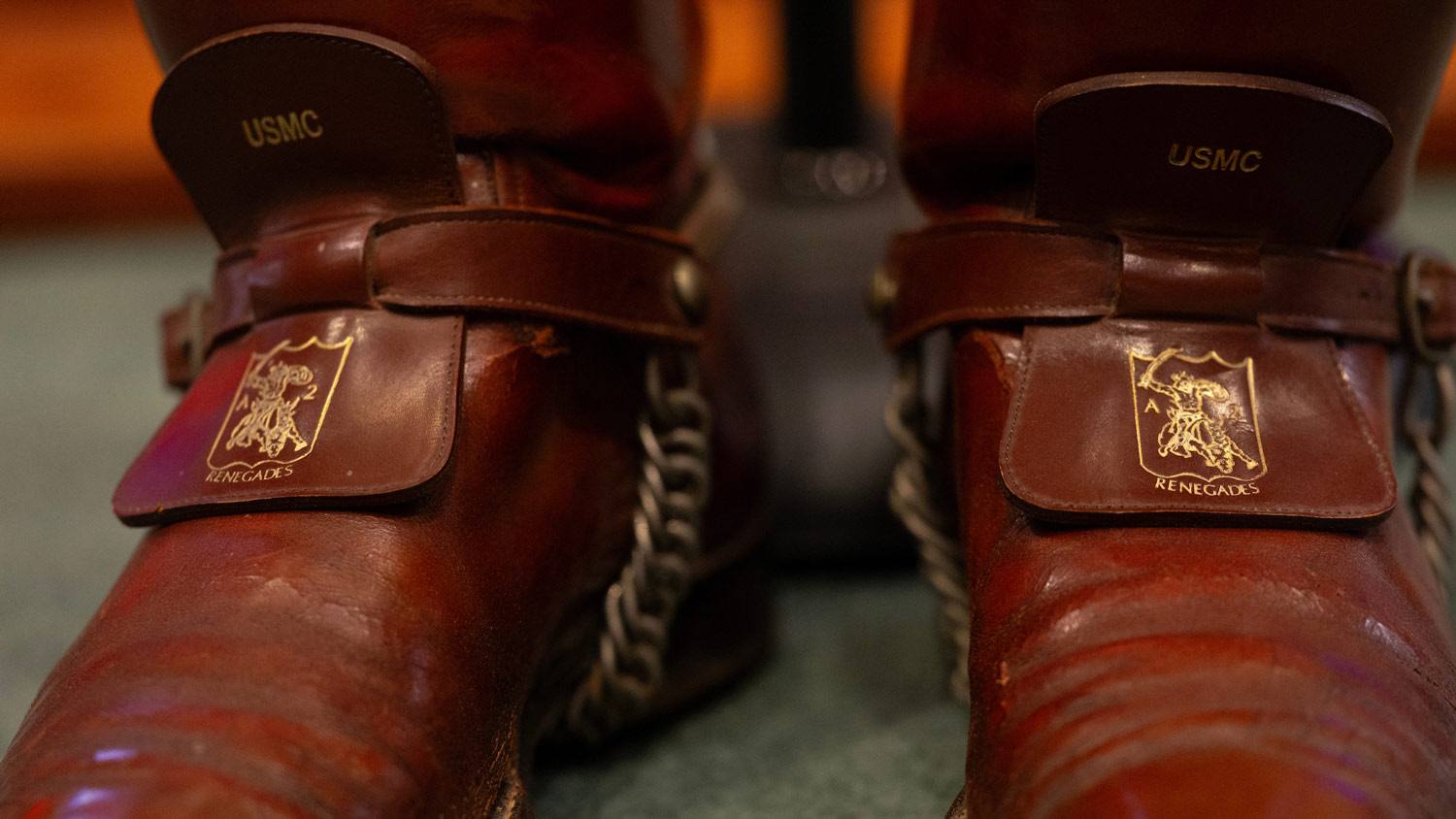 Close up of Capt. Forrester's shiny senior boots