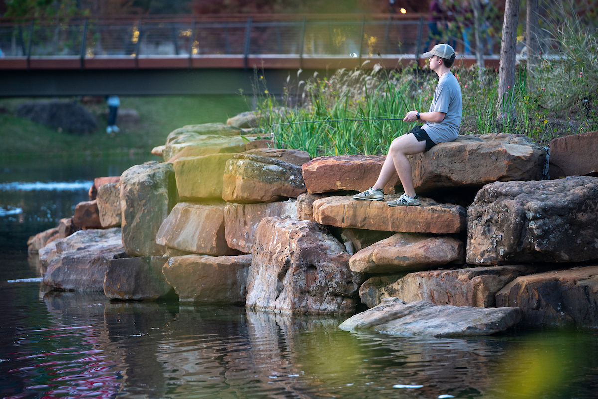 a fisherman in Aggie Park