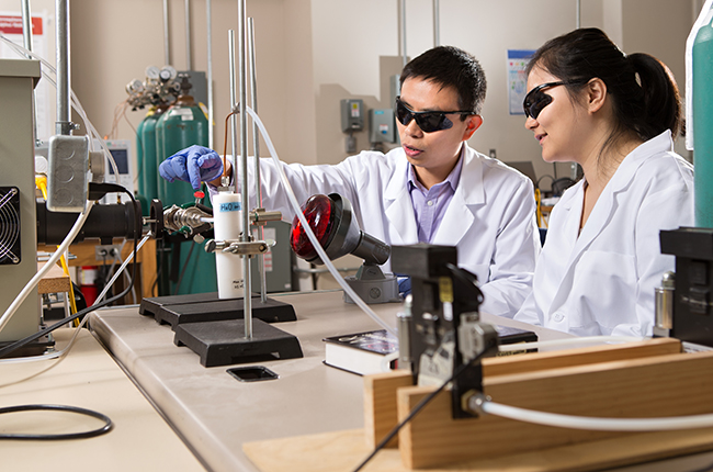 Mechanical engineering professor Ying Li (left) conducts research funded by an National Science Foundation CAREER grant. (Photo courtesy of the College of Engineering)