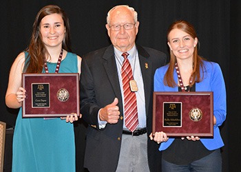 Left to right: Corie Depue, Colonel Henry Hill and Shelby Schiefelbein.