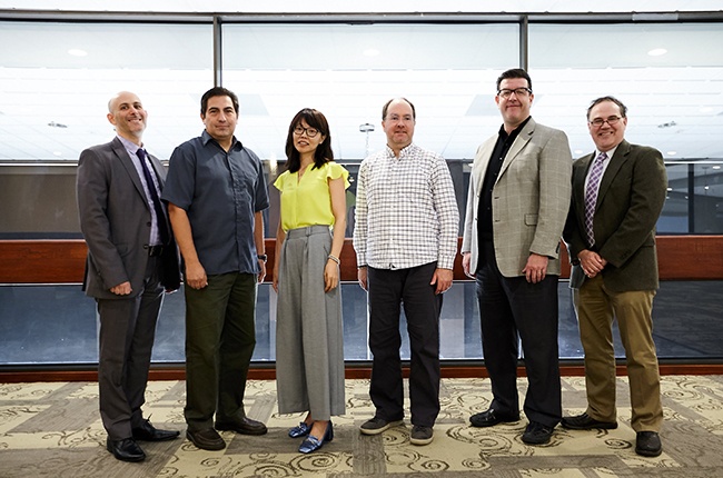 From left: Ira Dworkin, an assistant professor in the Department of English; Diego von Vacano, an associate professor in the Department of Political Science; Jun Lei, an assistant professor in the Department of International Studies; Martin P. Regan, an associate professor and associate head of the Department of Performance Studies; Jeffrey M. Morris, an associate professor in the Department of Performance Studies; and Adam R. Seipp, a professor in the Department of History. Angela P. Hudson, an associate professor in the Department of History, did not attend the ceremony.