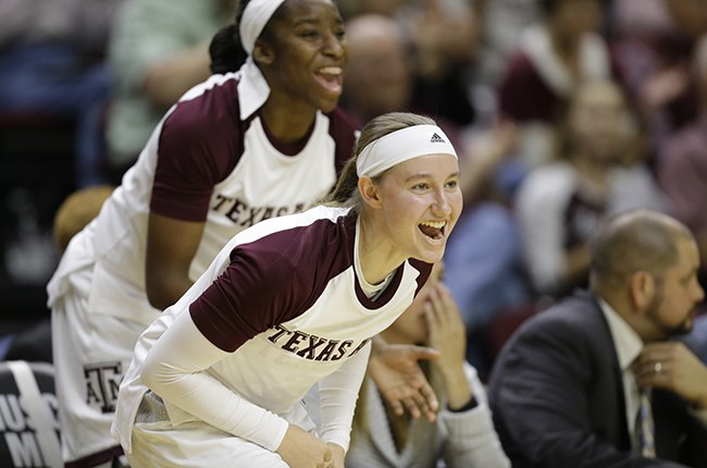 Alyssa Michalke cheering for her team from the bench against Arkansas