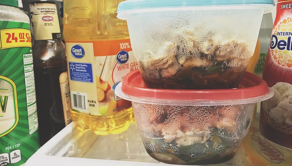Full Tupperware in fridge with juice