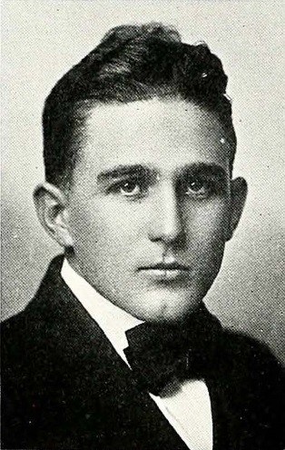 Black and white headshot of South in formal attire