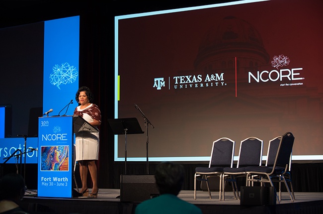 Christine Stanly presents onstage at NCORE