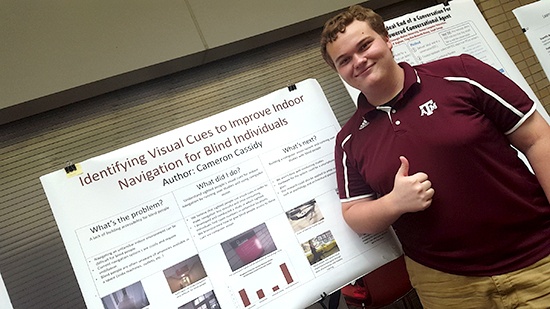 Cameron Cassidy posing with poster presentation